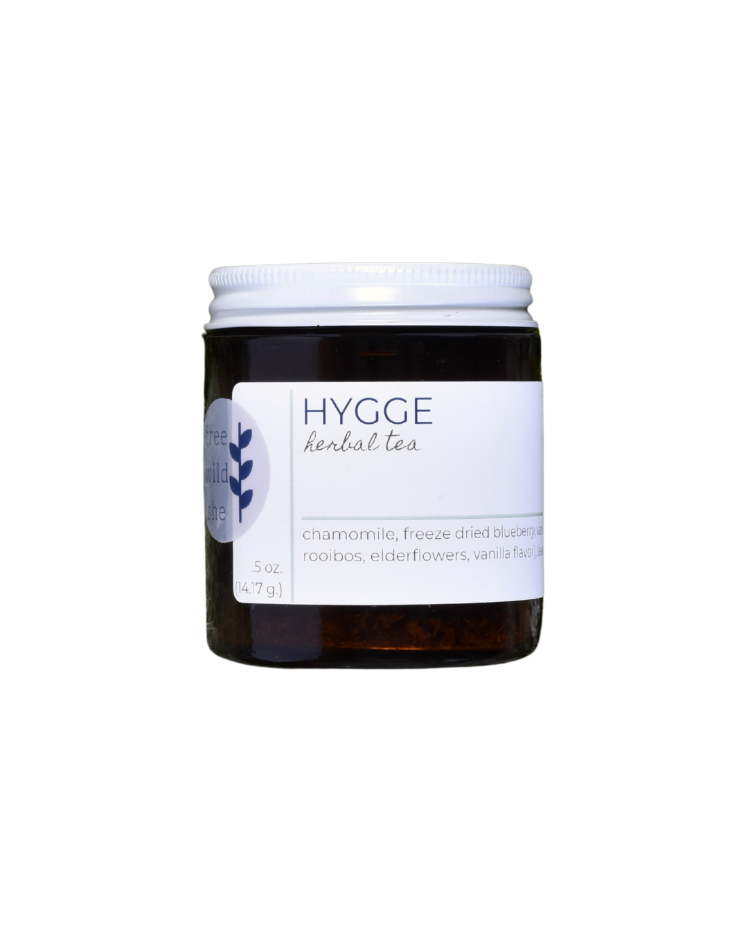 A 20 serving jar of FreeWildShe Hygge Herbal Tea. The jar is dark brown, the lid is white metal, the label is white with navy & gray text. The background is transparent.