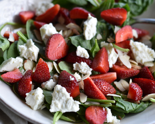 A fresh summer spinach salad with strawberries, feta, almonds and a playful Strawberry Hibiscus Bitters dressing. A curious bitters recipe beyond drinks.