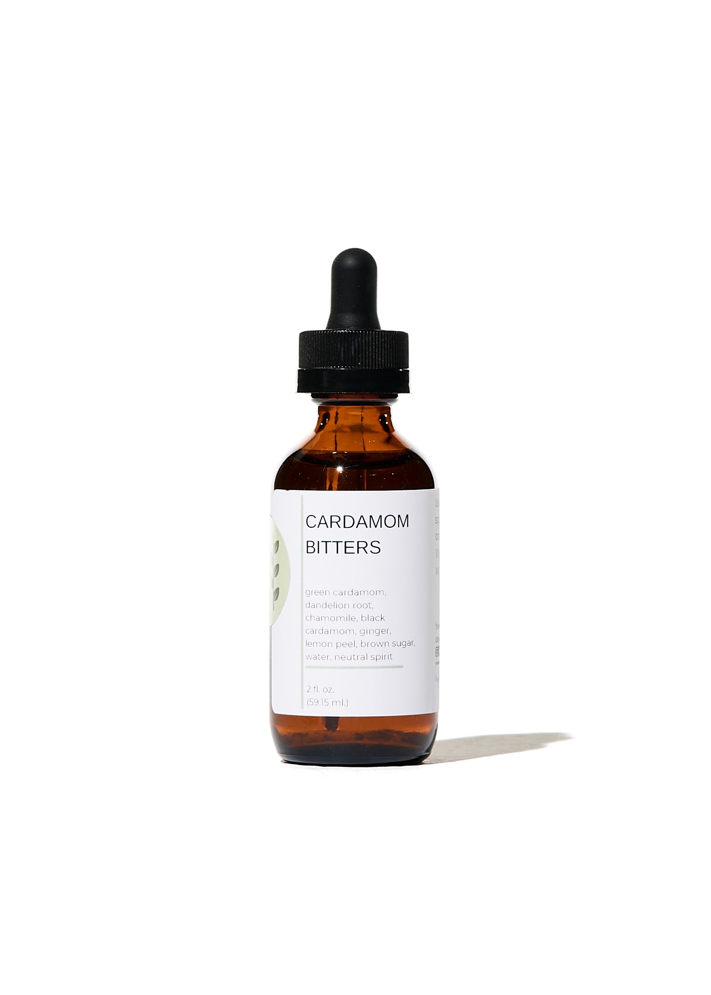 FreeWildShe Cardamom Bitters with a bright white background.