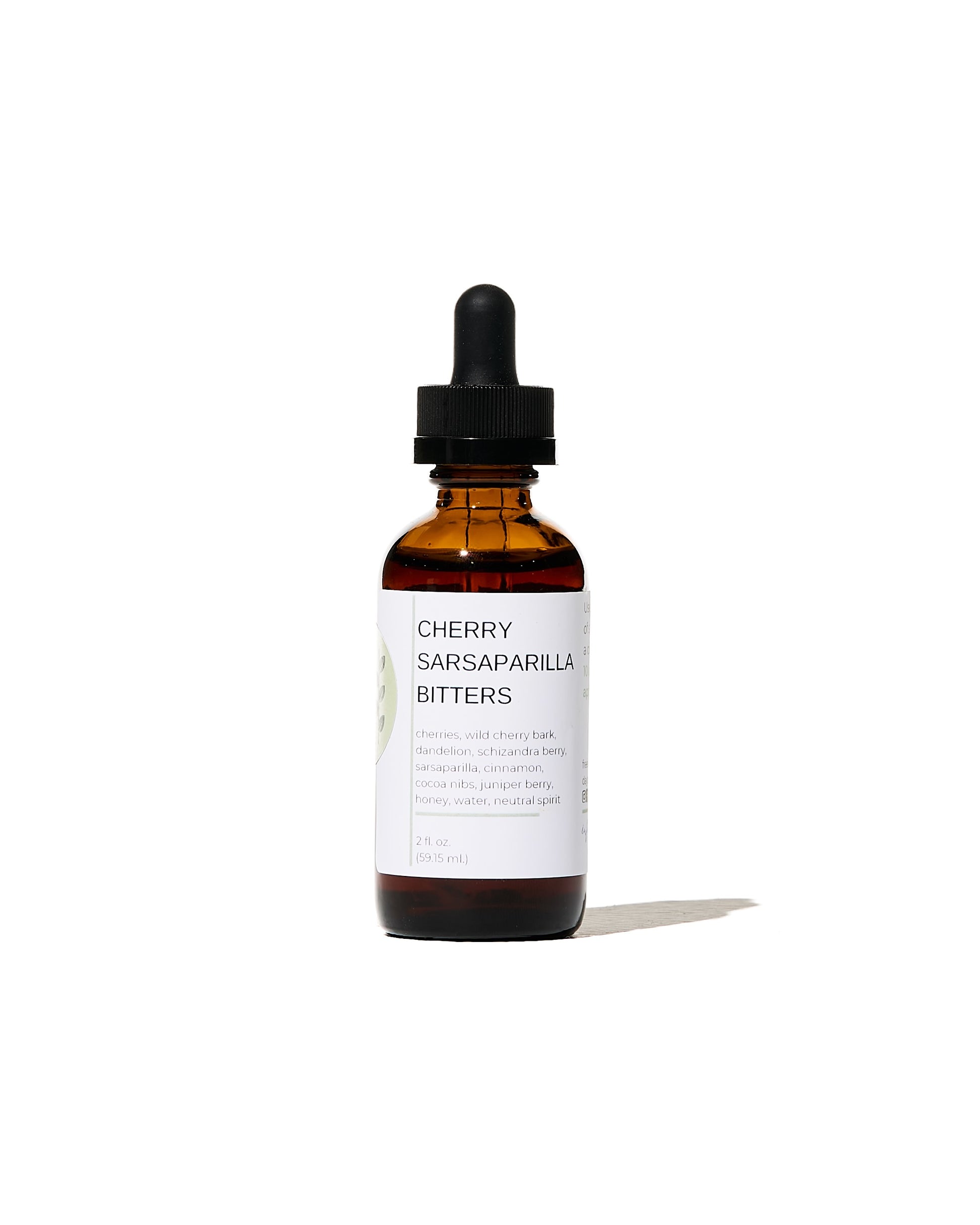 FreeWildShe Cherry Sarsaparilla Bitters with a bright white background.