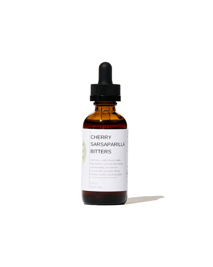FreeWildShe Cherry Sarsaparilla Bitters with a bright white background.