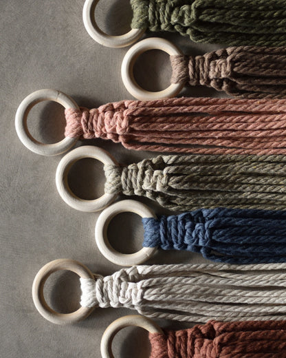 The wooden ring top of seven colors of FreeWildShe Ayla Macrame Plant Hangers.