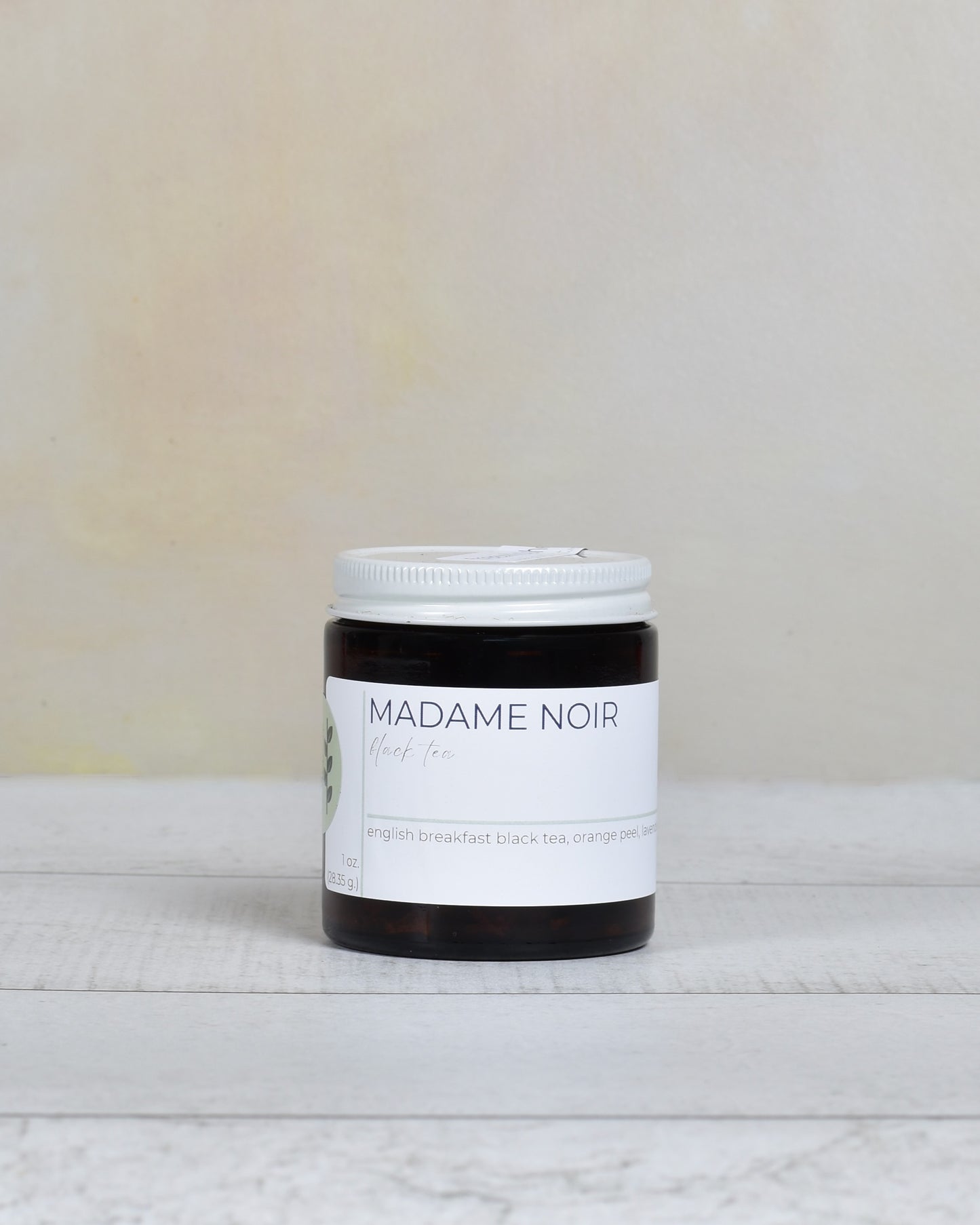 FreeWildShe Madame Noir Black Tea 20 servings sits on a white countertop.