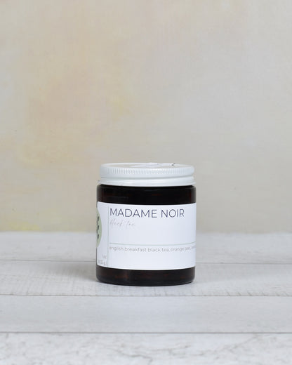 FreeWildShe Madame Noir Black Tea 20 servings sits on a white countertop.