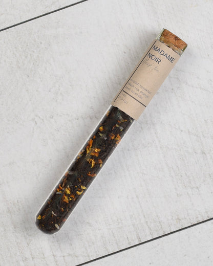 FreeWildShe Madame Noir Black Tea 8 servings sits on a white countertop.